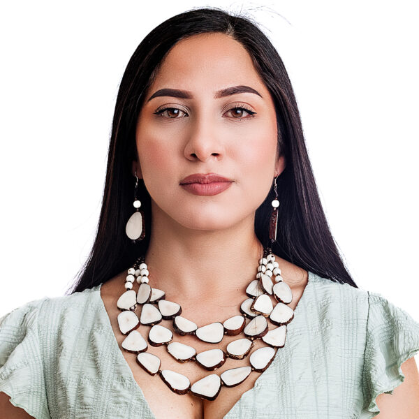 Wholesale Layered White Tagua Necklace Handmade Eco Jewelry, Elevate your boutique’s collection with our Wholesale Layered White Tagua Necklace, handmade in Ecuador using 100% natural tagua nuts—also known as vegetable ivory. This layered bib-style necklace features smooth, polished white slices of tagua, offering a refined, organic look. Each piece is ethically crafted by skilled artisans and designed for comfort, with adjustable cords to suit all styles and occasions. Perfect for eco-conscious shoppers looking for standout accessories that are both elegant and sustainable. 🧡 Ideal for boutique owners who value ✔️ Handmade, fair trade craftsmanship ✔️ Vegan and biodegradable statement pieces ✔️ Minimalist and organic designs ✔️ Unique jewelry made from natural tagua seeds ✔️ Ethical fashion directly sourced from Ecuador Offer your customers bold, nature-inspired jewelry that speaks to sustainability and timeless beauty. Ideal for gift shops, fashion boutiques, and conscious concept stores.